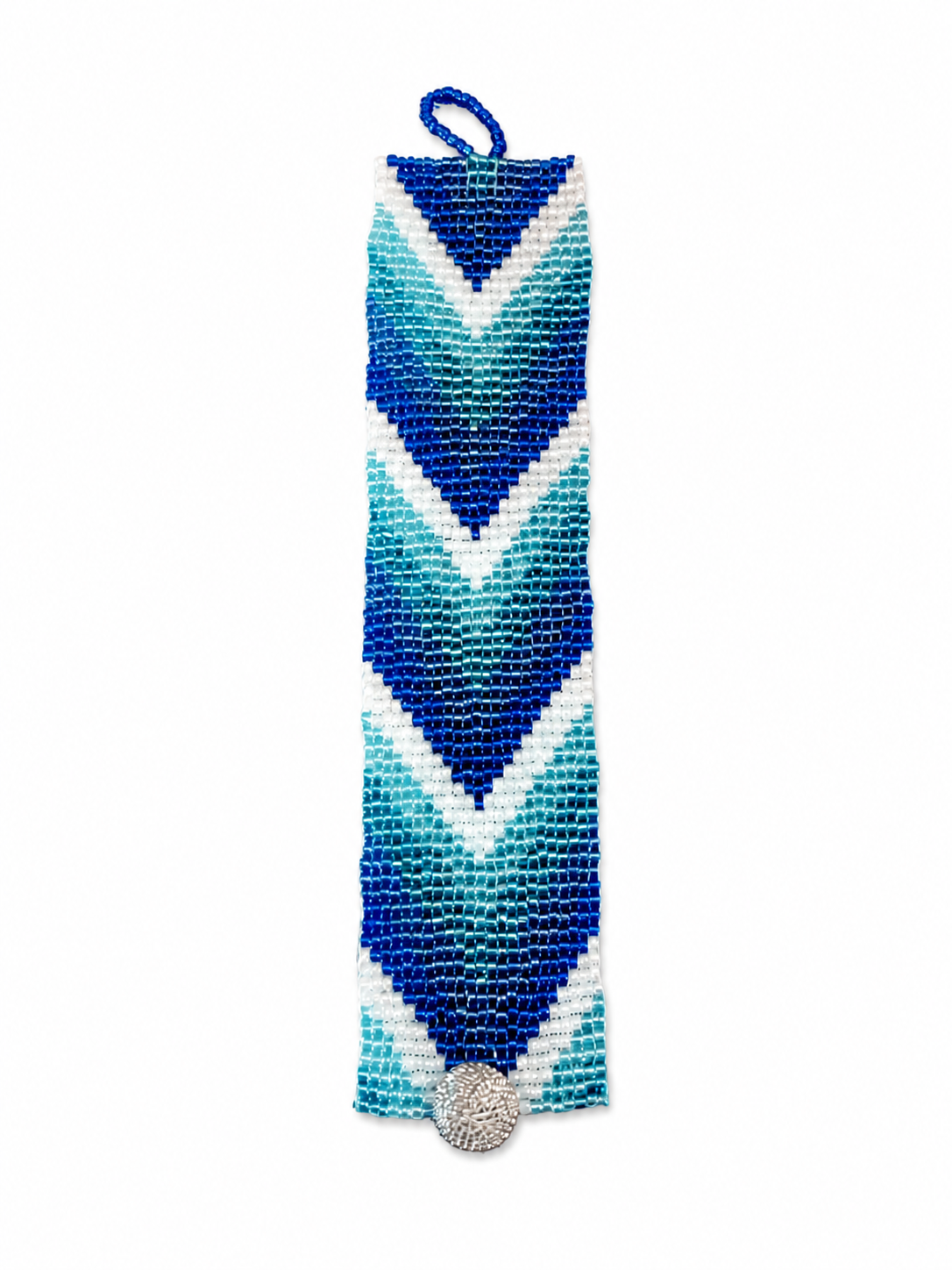 Loom-woven bracelet in layered blue, aqua, and white chevron pattern with silver button clasp.