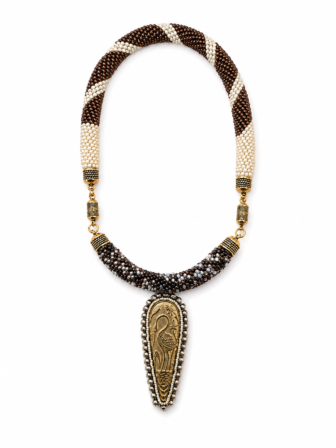 Beadwoven rope necklace in cream and brown with brass accents and an Egyptian-inspired pendant centerpiece.